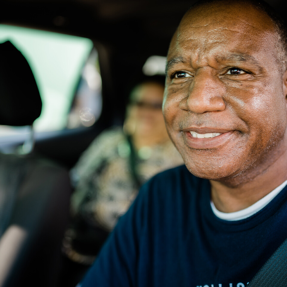 UZURV driver with passenger in the backseat